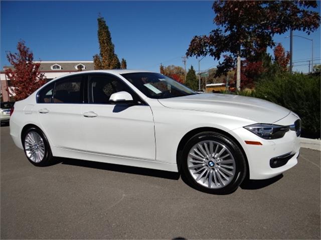 2014 BMW 3 series 2008 Nissan 1.8 SL