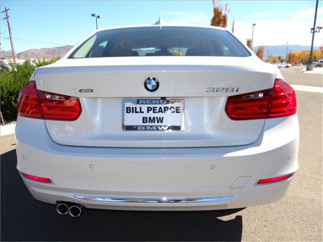 2014 BMW 3 series 2008 Nissan 1.8 SL