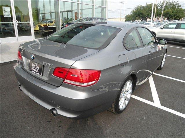 2009 BMW 3 series 2011 Chevrolet LT