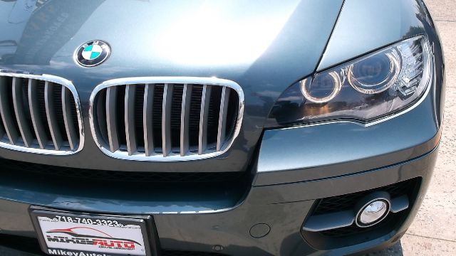 2011 BMW X6 1999 Toyota CE