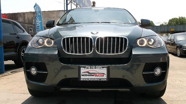 2011 BMW X6 1999 Toyota CE