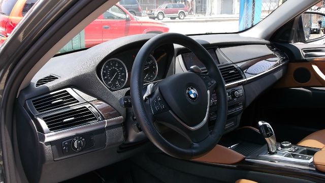 2011 BMW X6 1999 Toyota CE
