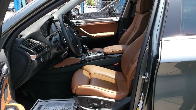 2011 BMW X6 1999 Toyota CE