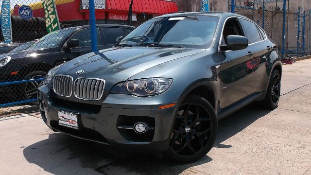2011 BMW X6 1999 Toyota CE