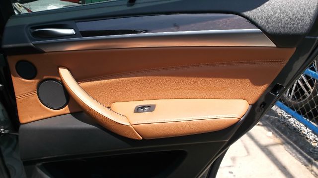 2011 BMW X6 1999 Toyota CE