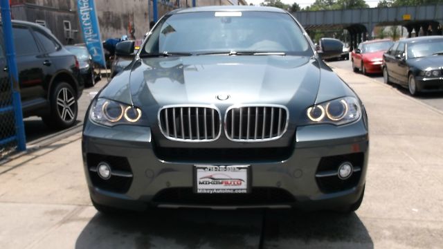 2011 BMW X6 1999 Toyota CE