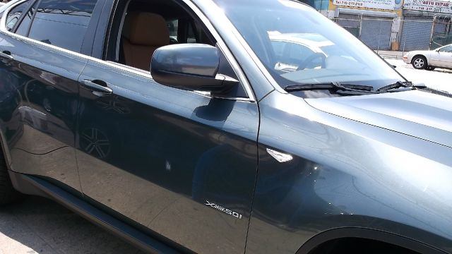 2011 BMW X6 1999 Toyota CE