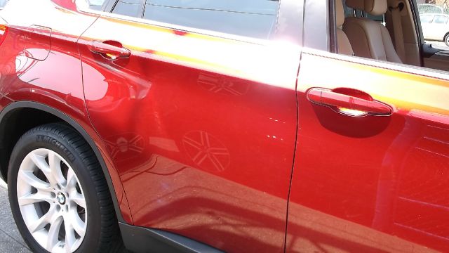 2011 BMW X6 1999 Toyota LE