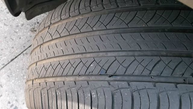 2011 BMW X6 1999 Toyota LE