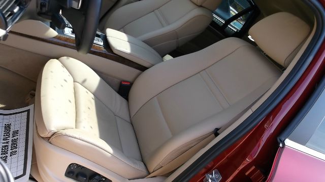 2011 BMW X6 1999 Toyota LE