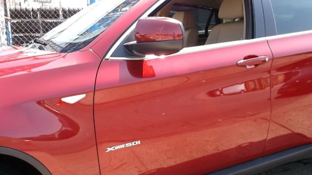 2011 BMW X6 1999 Toyota LE