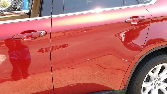 2011 BMW X6 1999 Toyota LE