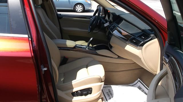 2011 BMW X6 1999 Toyota LE