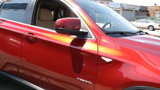 2011 BMW X6 1999 Toyota LE