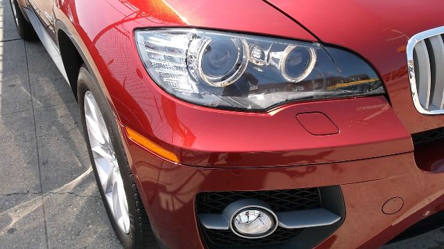 2011 BMW X6 1999 Toyota LE