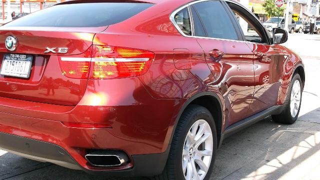 2011 BMW X6 1999 Toyota LE