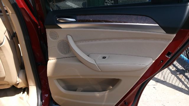 2011 BMW X6 1999 Toyota LE