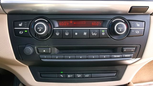 2011 BMW X6 1999 Toyota LE