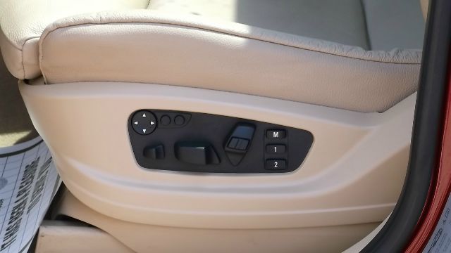 2011 BMW X6 1999 Toyota LE