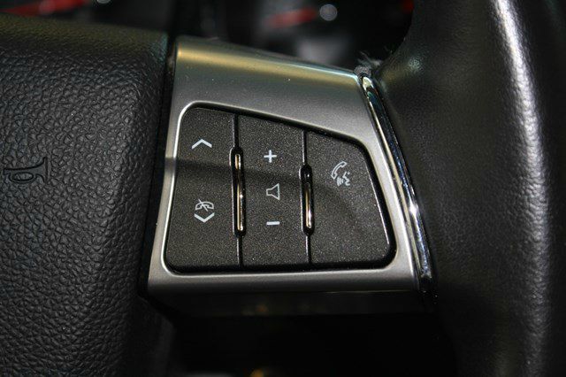 2010 Cadillac CTS 2010 Volkswagen SE