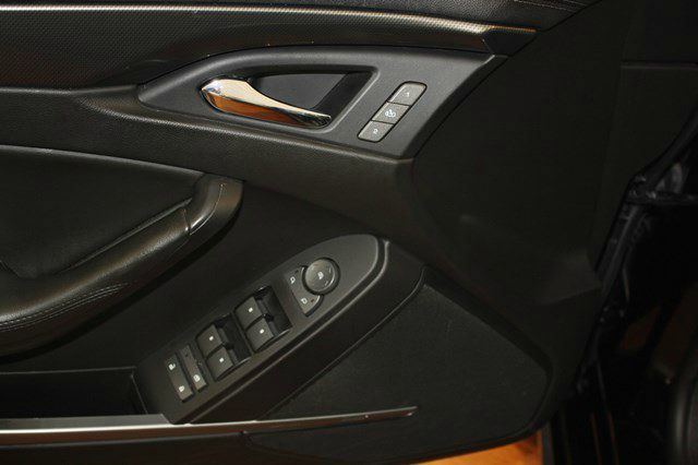 2010 Cadillac CTS 2010 Volkswagen SE