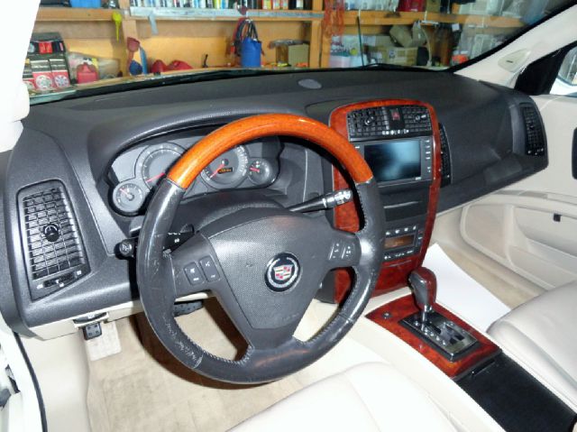 2004 Cadillac SRX 2006 Mercury Premier