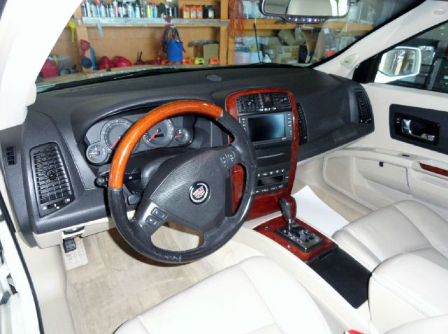 2004 Cadillac SRX 2006 Mercury Premier