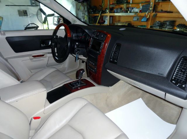 2004 Cadillac SRX 2006 Mercury Premier