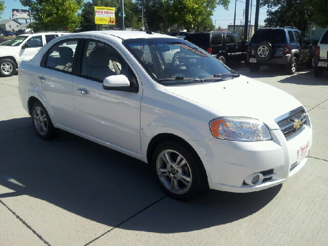 2009 Chevrolet Aveo 2003 Mazda LX