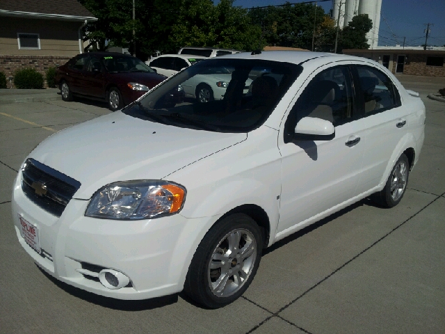 2009 Chevrolet Aveo 2003 Mazda LX
