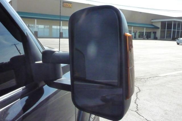 2005 Chevrolet C3500 2008 Nissan 2.5 SL