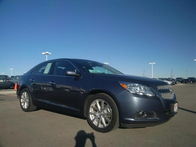 2013 Chevrolet Malibu 2010 Kia SX