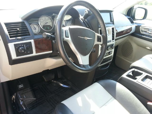 2010 Chrysler Town and Country 2007 Mazda Mazda3 S Sport