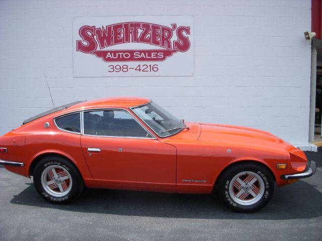 1973 Datsun 120 2004 Jeep Sport