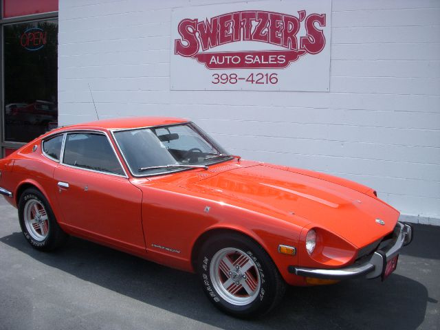 1973 Datsun 120 2004 Jeep Sport