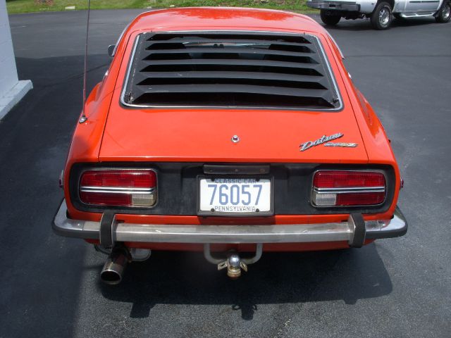 1973 Datsun 120 2004 Jeep Sport