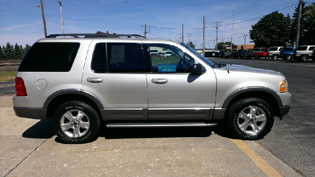 2003 Ford Explorer 2002 Mazda DX
