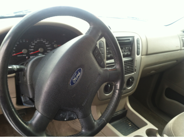 2003 Ford Explorer 2002 Mazda DX