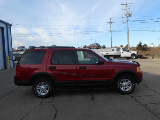 2003 Ford Explorer 2002 Mazda DX