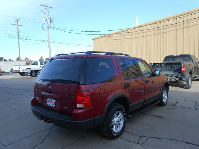 2003 Ford Explorer 2002 Mazda DX