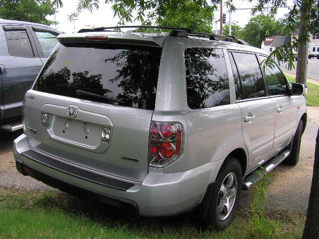 2006 Honda Pilot 2010 Cadillac CTS