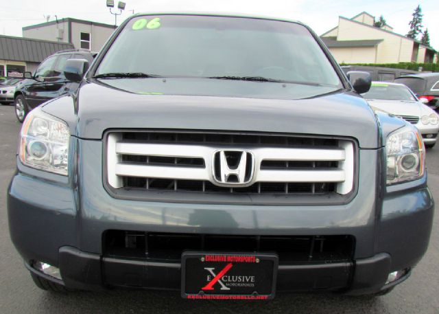 2006 Honda Pilot 2010 Cadillac CTS