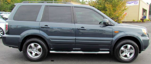 2006 Honda Pilot 2010 Cadillac CTS