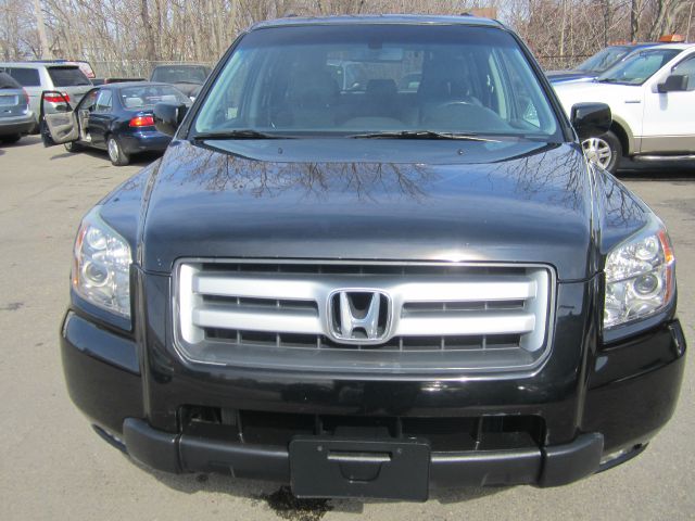 2006 Honda Pilot 2010 Cadillac CTS
