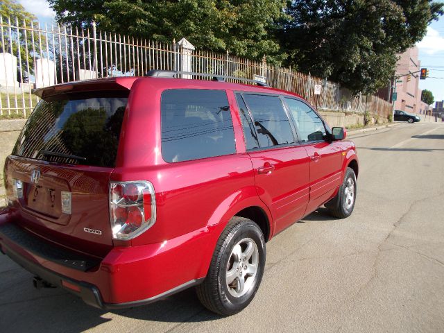 2006 Honda Pilot 2010 Cadillac CTS