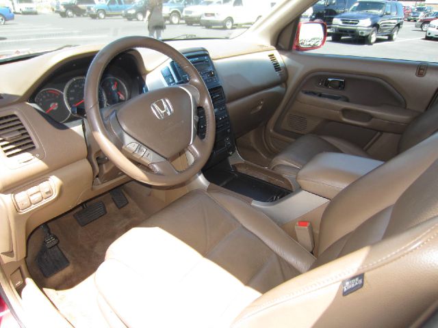 2006 Honda Pilot 2010 Cadillac CTS