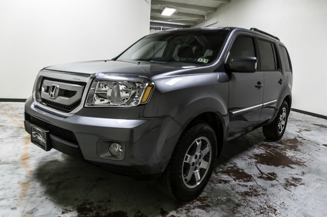 2009 Honda Pilot 2008 Nissan XE