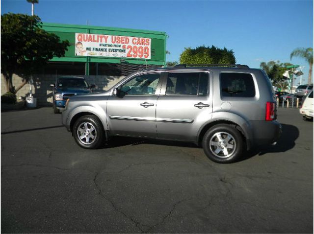 2009 Honda Pilot 2008 Nissan XE