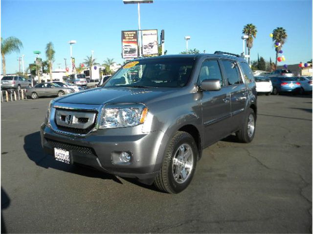 2009 Honda Pilot 2008 Nissan XE