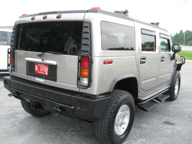 2003 Hummer H2 Scion XB